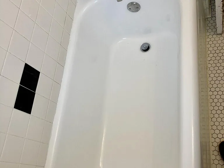 Cast iron tub.