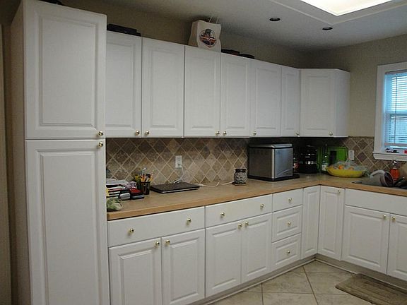 Loads of upper/lower cabinets so plenty of storage space in this oversized kitchen.