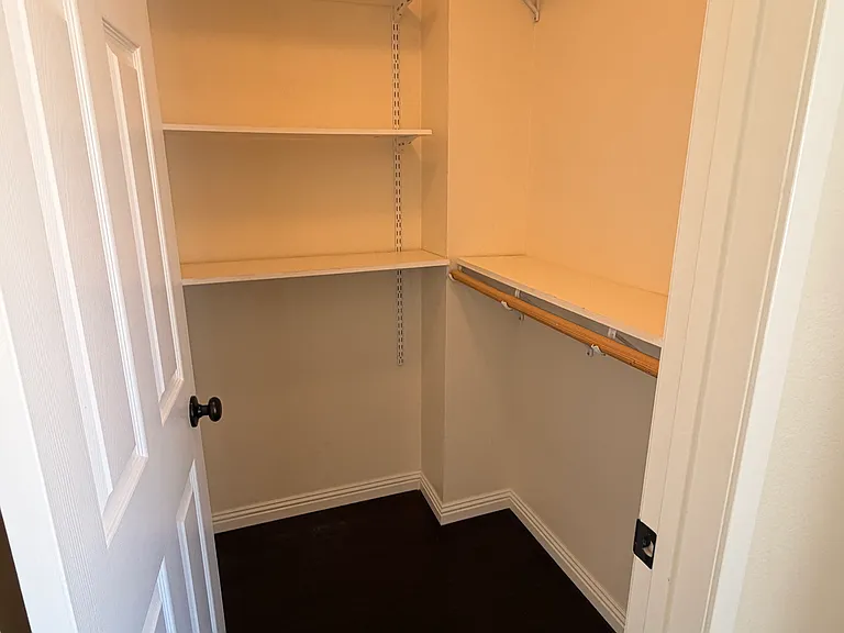 Main floor bedroom walk-in closet.