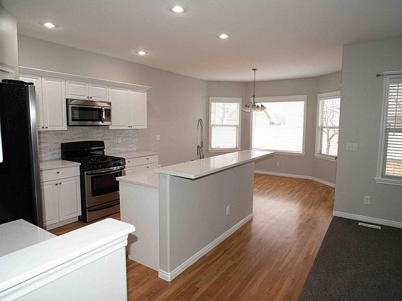 Open concept kitchen into living room