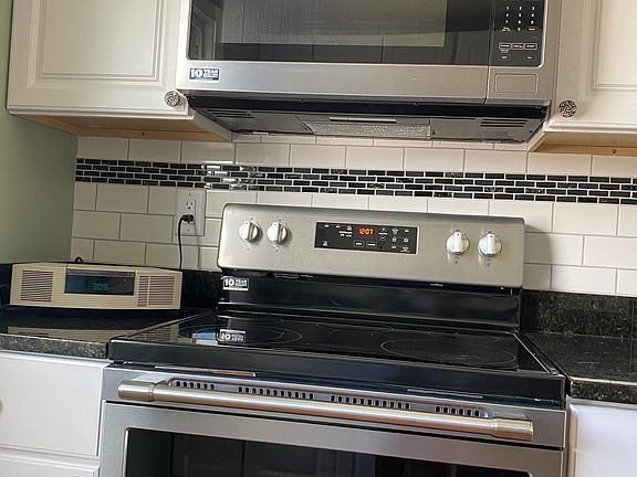 Brand new Maytag microwave and self-cleaning, smoothtop range/oven