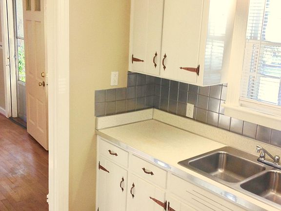 Vintage Kitchen Cabinets and Counter w/ Stainless Steel Backsplash