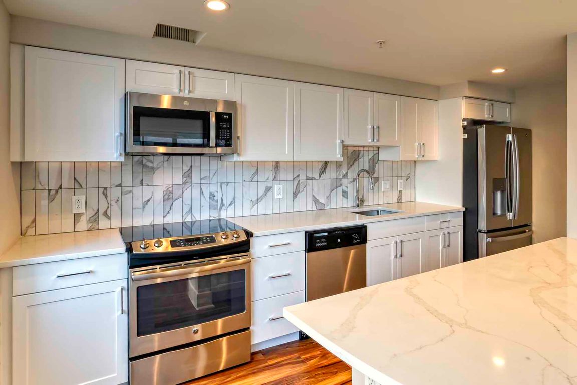 Select homes feature upgraded kitchens with quartz countertops