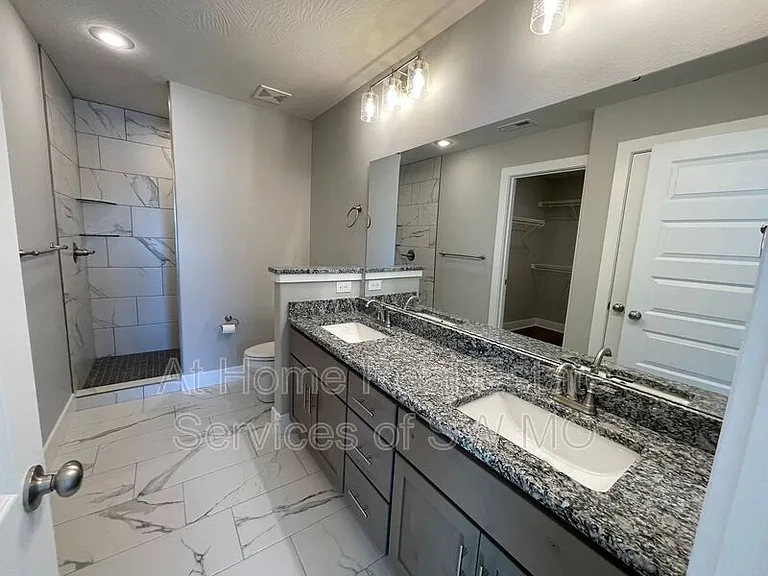 5943 S Iris Ln — Photo 11