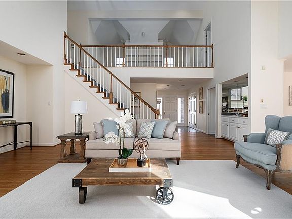 Great room with wet bar and loft area upstairs.