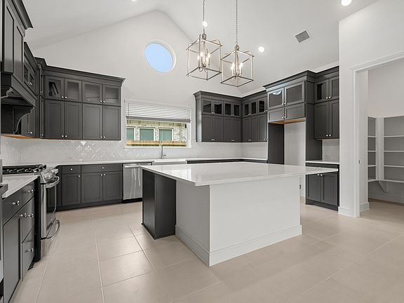 Kitchen with vaulted ceiling