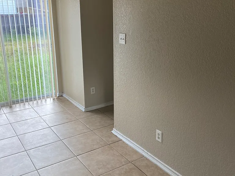 This area in kitchen leads to 1/2 bathroom, washer & dryer, pantry area and garage