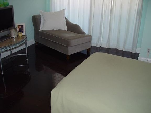 Mastersuite with espresso floors