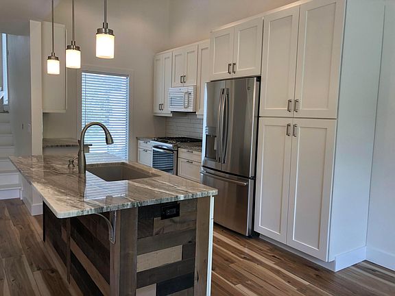 Large pantry cabinet with soft-close pull-out drawers for lots of storage. All new stainless steel appliances, gas range.