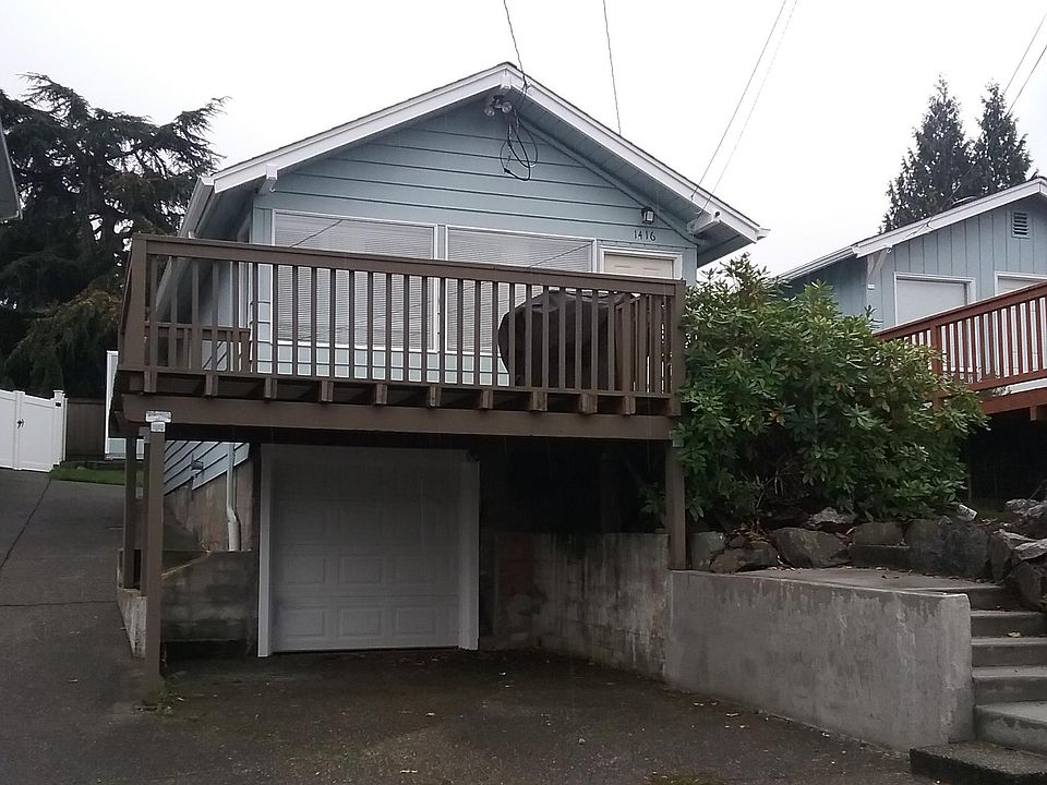 1416 from street, covered parking spot and small garage with electric opener for storage/shop. On a clear day you can see the North Cascades and sometimes our resident eagles in the park over Emory's on the Lake Restaurant, a ten minute walk.