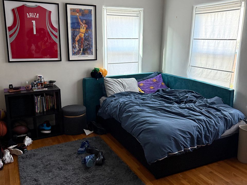 Each bedroom has refinished or newer hardwood floors. This bedroom has an ensuite 3/4 bathroom attached.