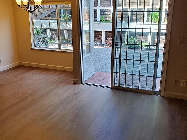 View of family room with entry from main floor hallway