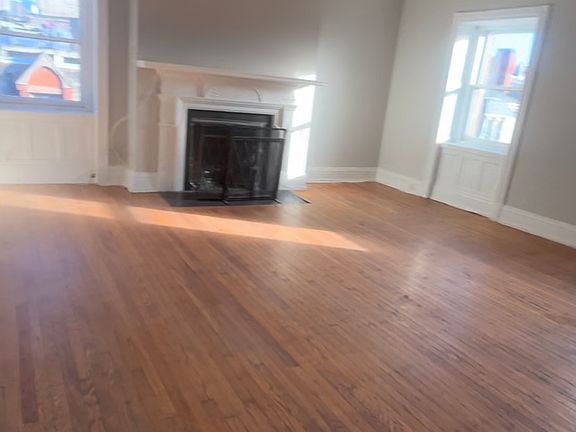 Living Room
4 windows overlooking the city
real wood fireplace