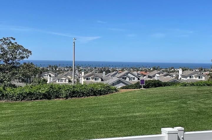 View from back patio, kitchen and primary bedroom.