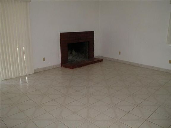 Spacious Living Room With Fireplace