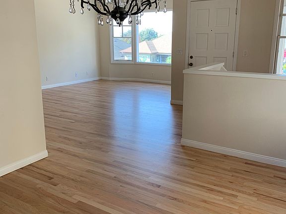 Upper Level From Dining Room. Beautiful red oak floors!