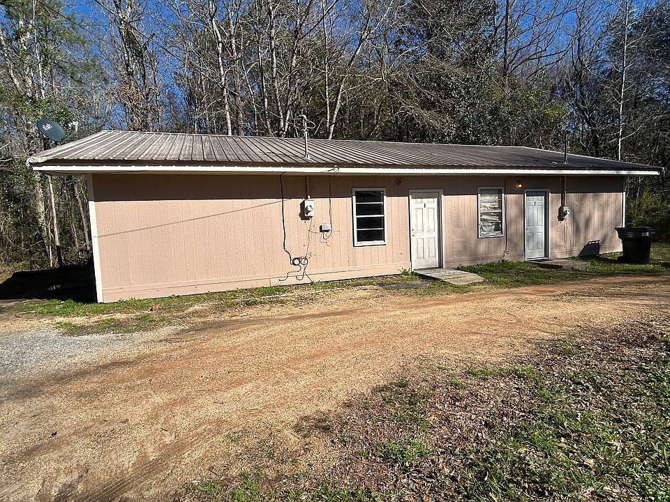 Duplex with 2 bedroom/1 bath, tile floors, central ac, all electric, refrigerator, stove, lawn serviced