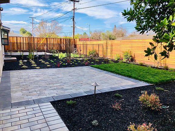 quiet and pleasant backyard garden with ample patio