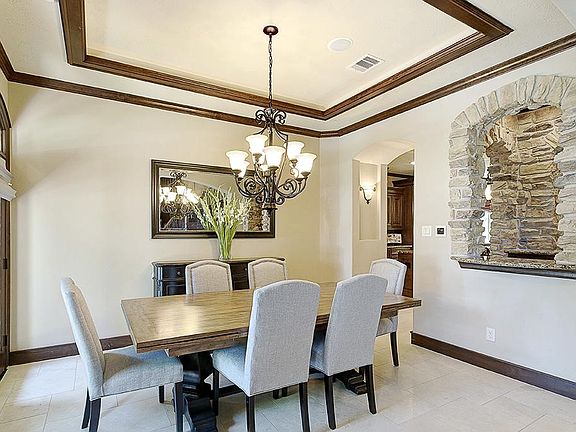 Formal Dining Room - window opening to wet bar