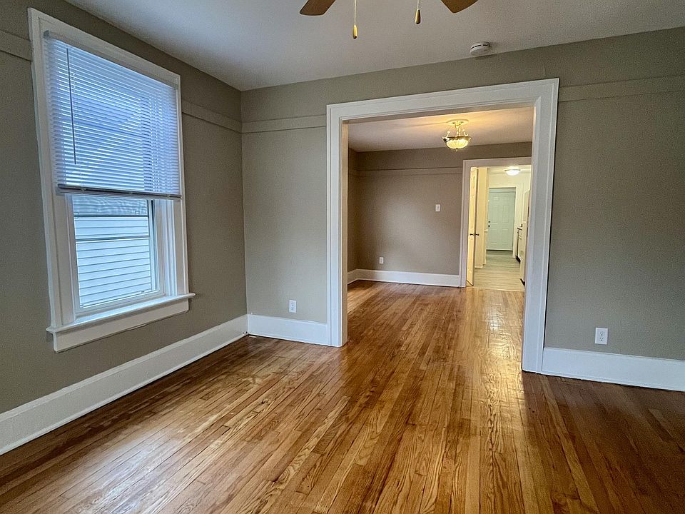 Living Room looking into Dining Room and Kitchen