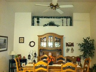 dining room with vaulted cei
