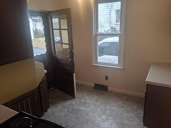 Plenty of cabinet space and equipped with stove.