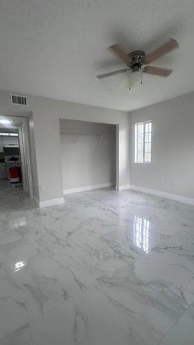 5011 Wiles Rd Photo 1