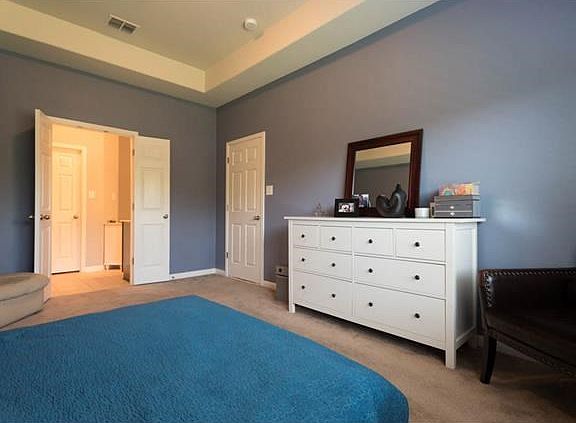 Oversized master with en suite bath and large walk-in closet