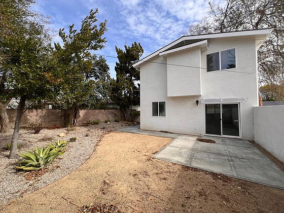 Private Backyard with sliding door to the living room.