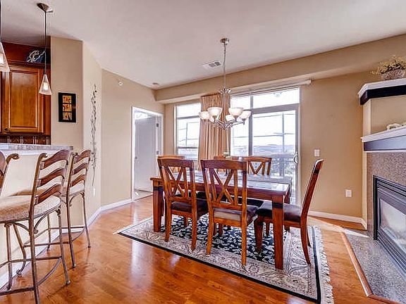 Dining Area with Island and Gas Fireplace