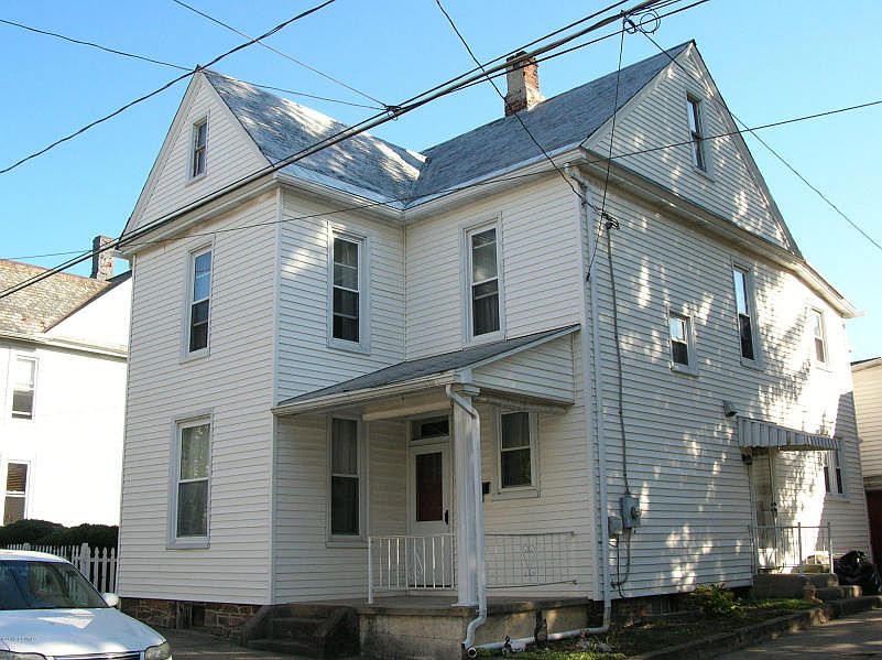 GREAT IN TOWN LOCATION WITH OFF STREET PARKING AND GARAGE.JUST REPLACED MAIN ROOF WITH NEW METAL ROOFING