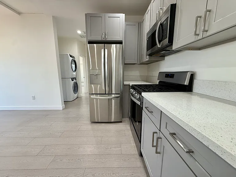 10723 Rhodesia Ave — Photo 6
