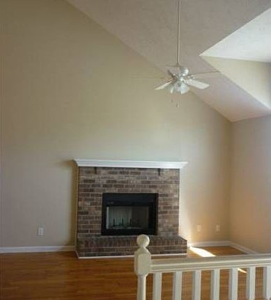 L.R. w/ High Ceiling & FP