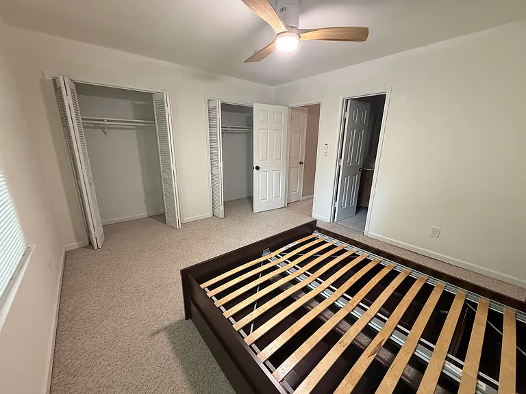 Back Bedroom (tenant can use this bed and these two nightstands or we can remove them.)

The back bedroom has two closets and a full bathroom.