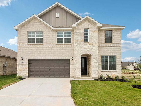 Front exterior of the Pine floorplan at a Meritage Homes community.