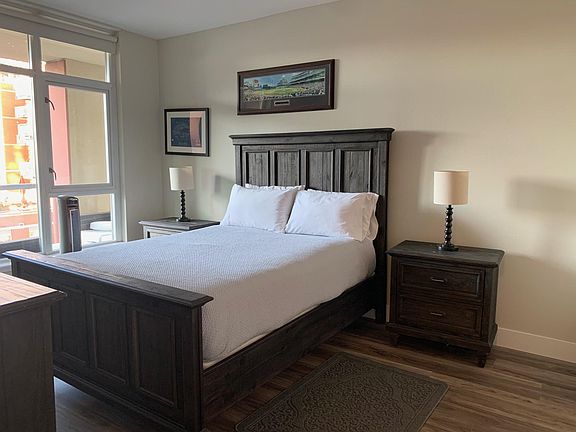 Queen side bedroom with double side table on each end