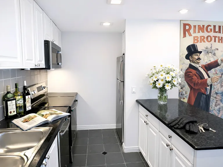 SS APPLNCS, BLACK GRANITE ISLAND COUNTER