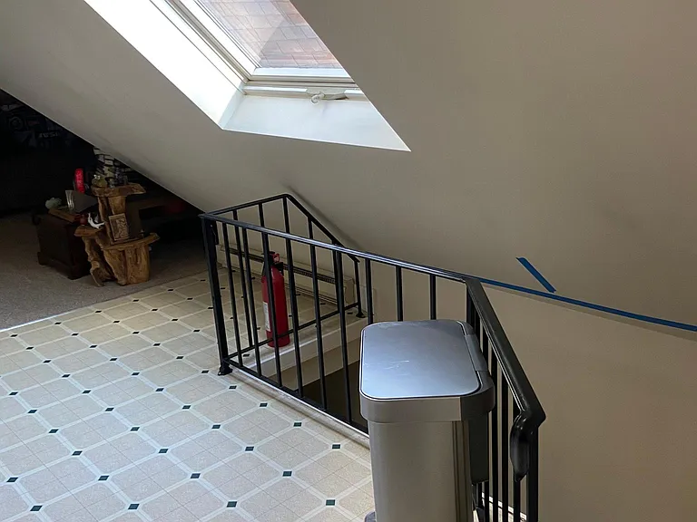 Staircase leading to kitchen