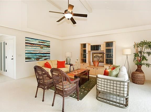 Very nice detailing with a formal entrance off to the side.  It's so nice to not walk into the unit and be greeted immediately by a kitchen!