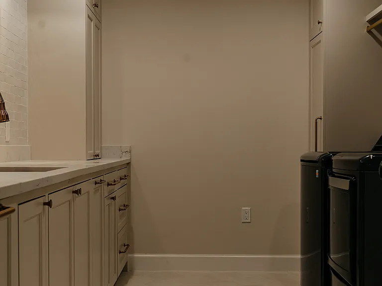 Laundry room in basement