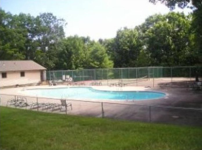 Small complex has own pool and sports courts--enjoy the summ