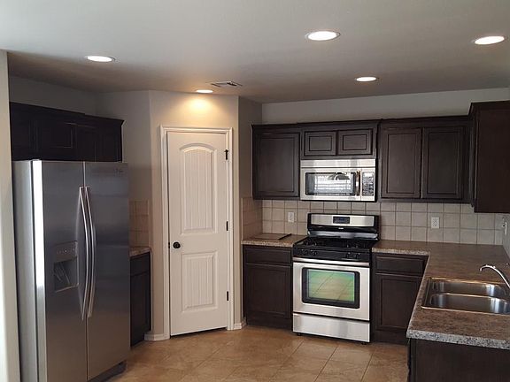 3rd image of 10917 N 154th East Ave