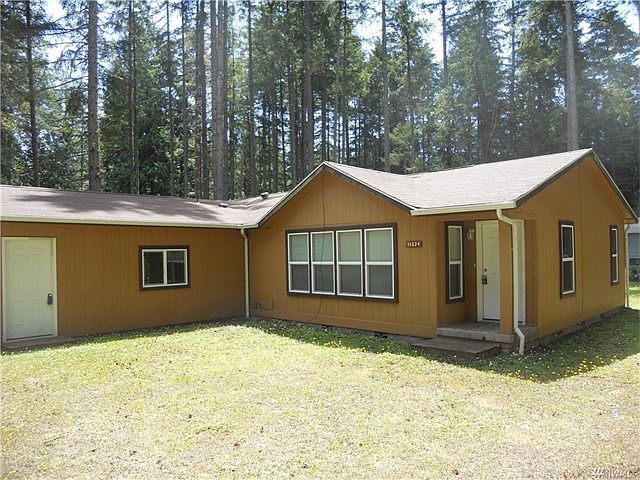 Welcome to your new home!  Lots of windows and a huge garage!