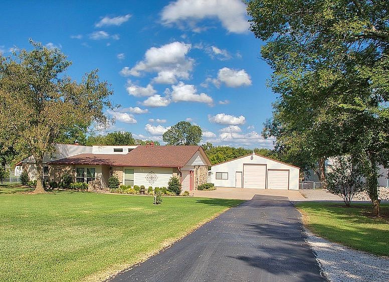 Beautiful 1 acre landscaped