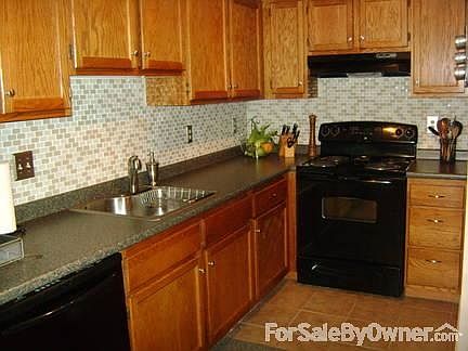 Renovated Kitchen
						:
						New sink/countertop, glass tile backsplash, tile floors, range, dishwasher
