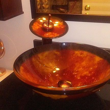 vessel sink on black granite