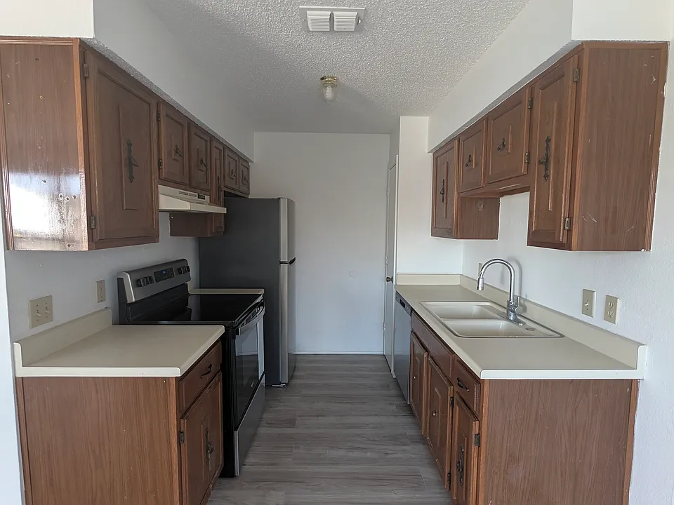 Looking into kitchen area from the eating area.