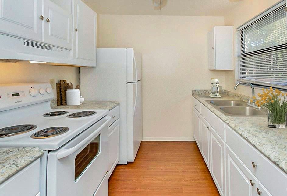 Prepare meals with ease in kitchens equipped with contemporary appliances, ample cabinetry, and functional layouts.