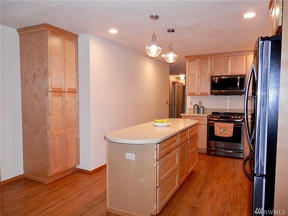 Plenty of cabinets in this kitchen.