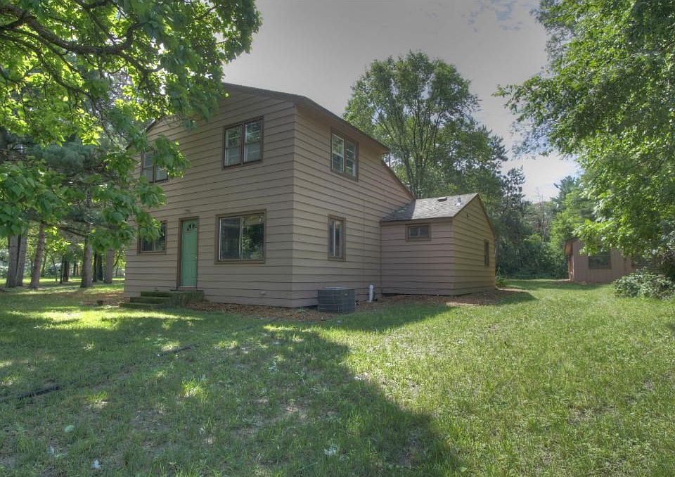 Nestled on an AMAZING 2 acre wooded lot. Great location close to Coon Lake.